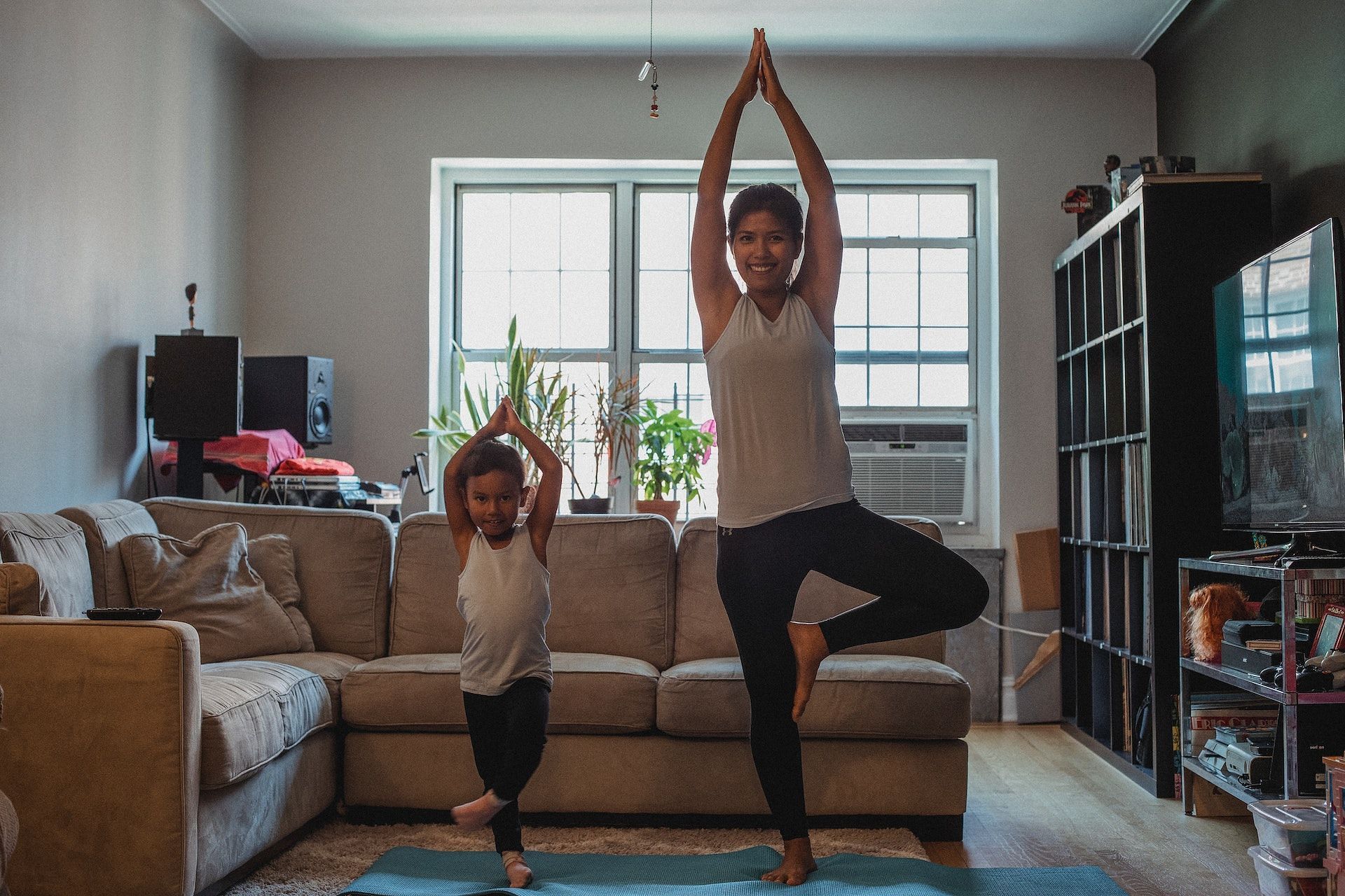 Tree pose strengthens your core and legs. (Photo via Pexels/Kamaji Ogino)